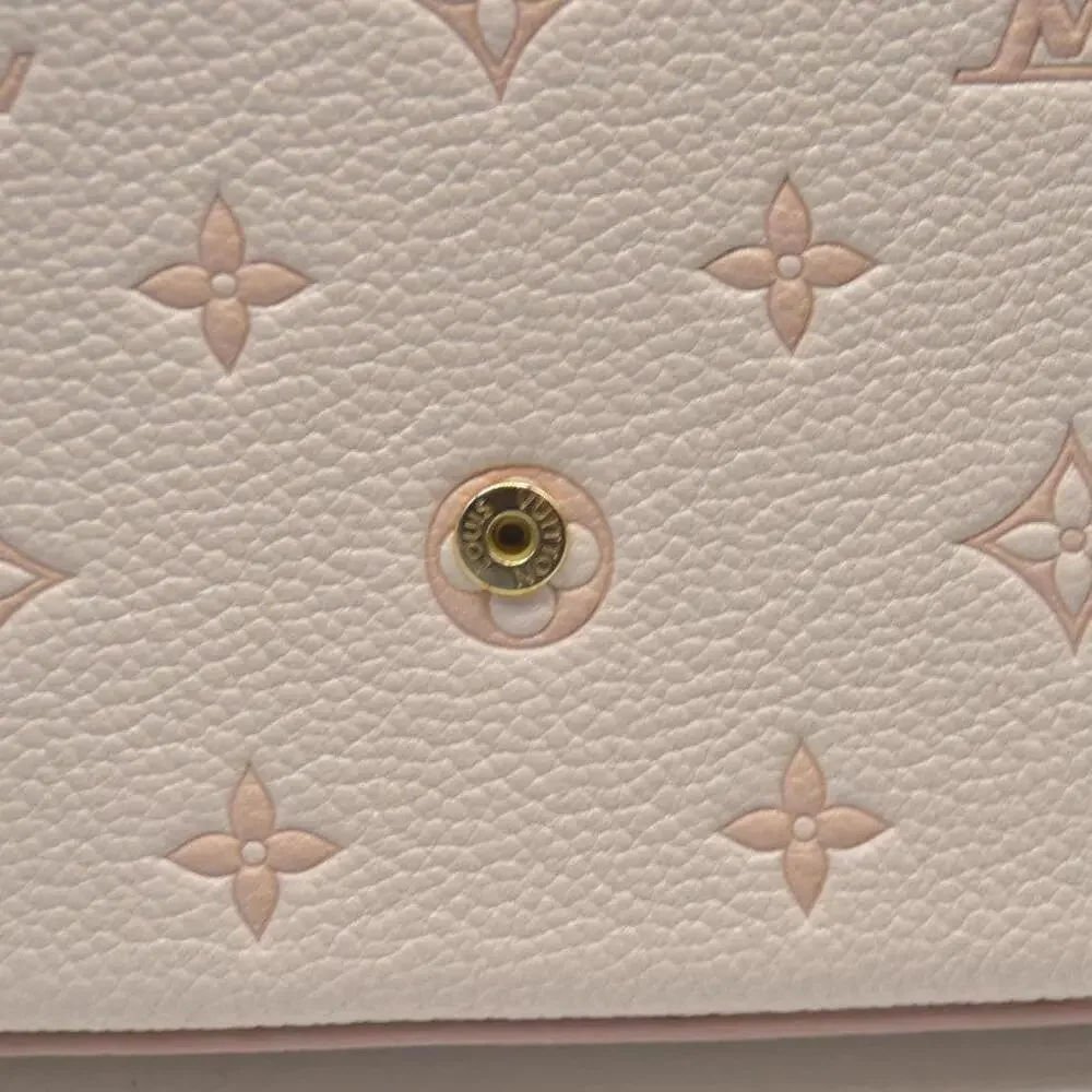 Louis Vuitton House's signature Monogram Pochette Felicie